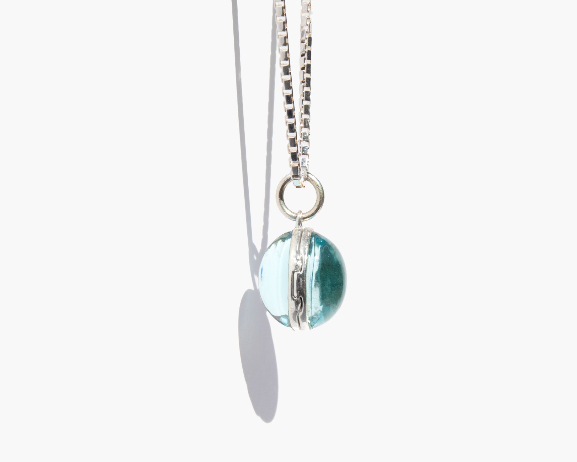 The Trance Locket Blue Topaz