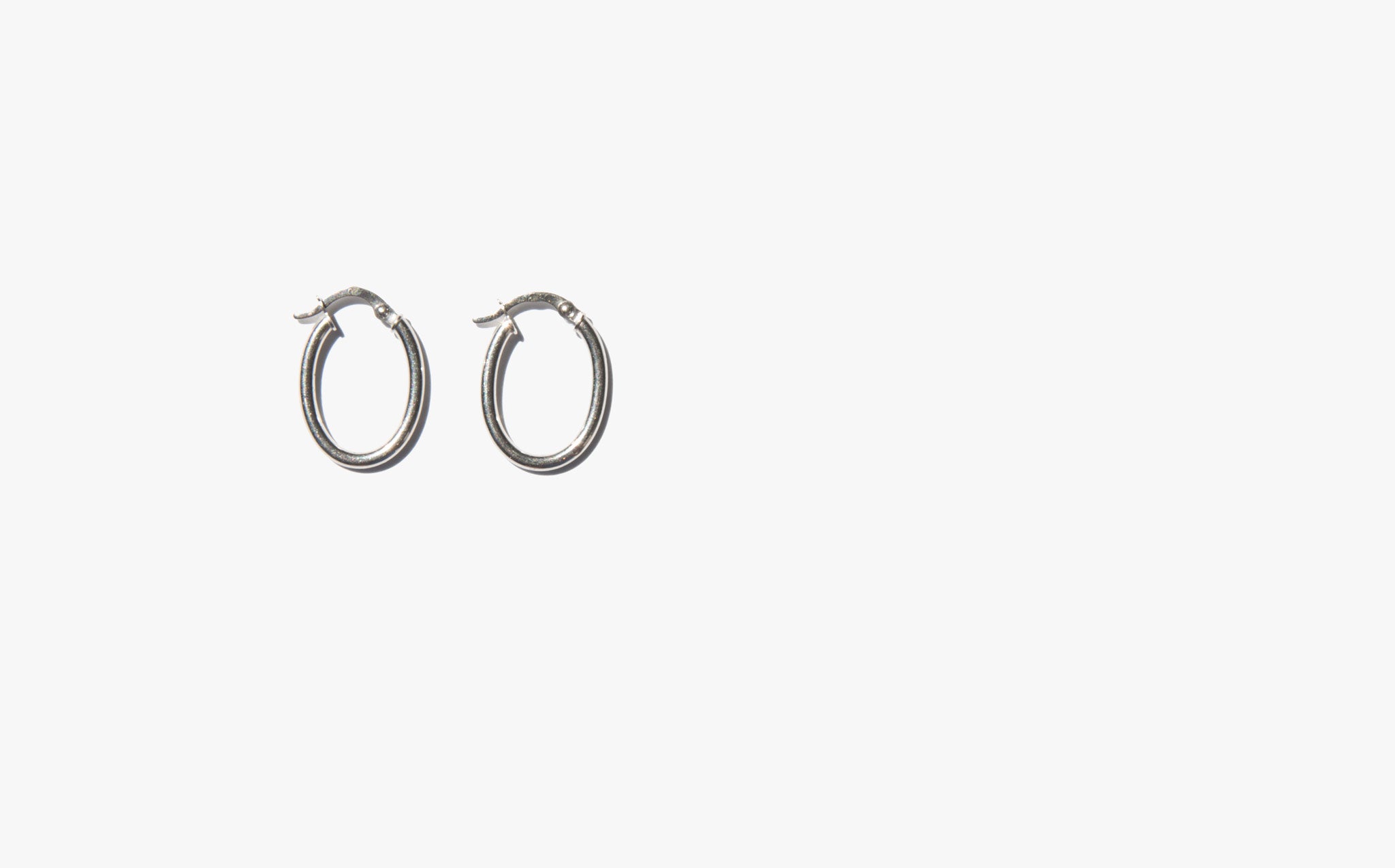 Classic White Gold Oval Hoop Earrings